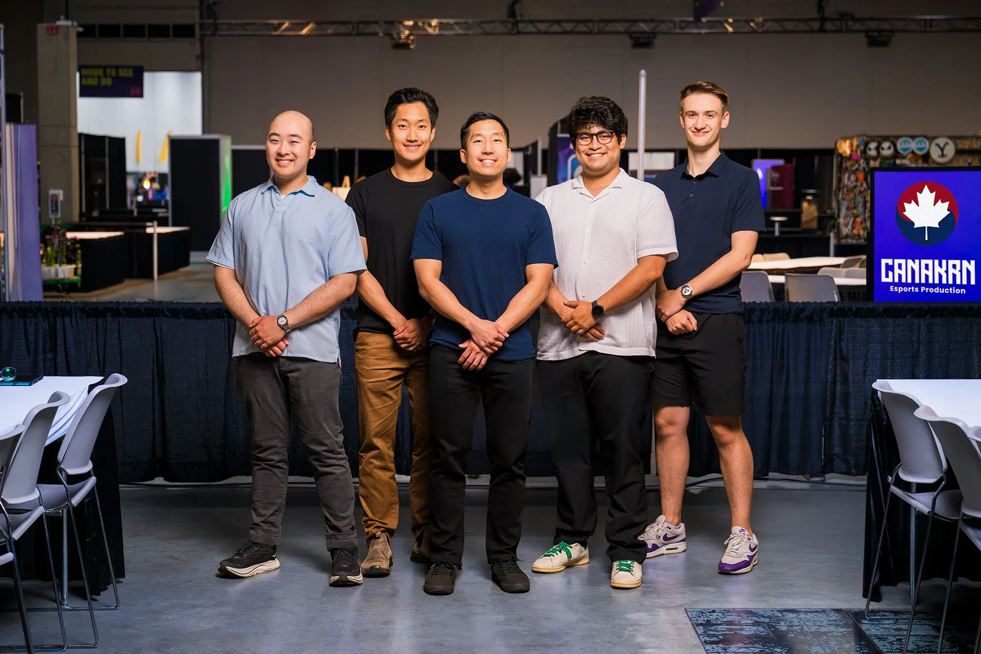The Canakrn team on the gaming floor at K-Days 2026, beside the Canakrn banner